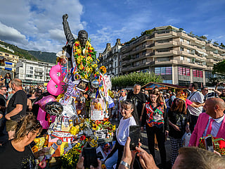Fans gather around the iconic Freddie Mercury statue overlooking Lake Geneva during Montreux Freddie Day, marking the 80th anniversary of the birth of the Queen frontman, in Montreux, Switzerland, on September 5, 2026. 