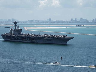 The 5,000-strong crew of the USS Abraham Lincoln docked just north of the resort town of Pattaya, near Bangkok, on Wednesday for five days of rest and recreation after a lengthy Middle East deployment.