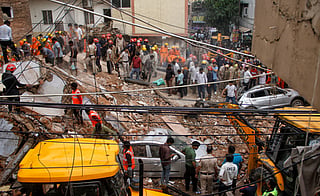 Police said the 40-50-year-old building, comprising a basement and five upper floors, collapsed at around 1.30pm.