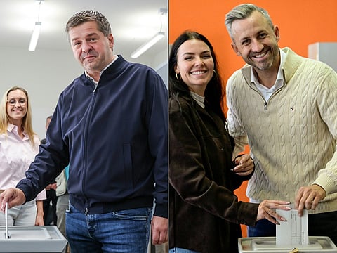 This combination of pictures created on September 6, 2026 shows Sven Schulze (picture at L), Saxony-Anhalt's State Premier and top candidate in the Saxony-Anhalt state election for the conservative Christian Democratic Union (CDU) party, casting his ballot for the state elections next to his wife Kati Schulze in Magdeburg, and Ulrich Siegmund (picture at R), top candidate in the Saxony-Anhalt state election for the far-right Alternative for Germany (AfD) party, and his wife Julia Siegmund casting their votes for the state elections in Saxony-Anhalt in Tangermuende, eastern Germany on September 6, 2026.
