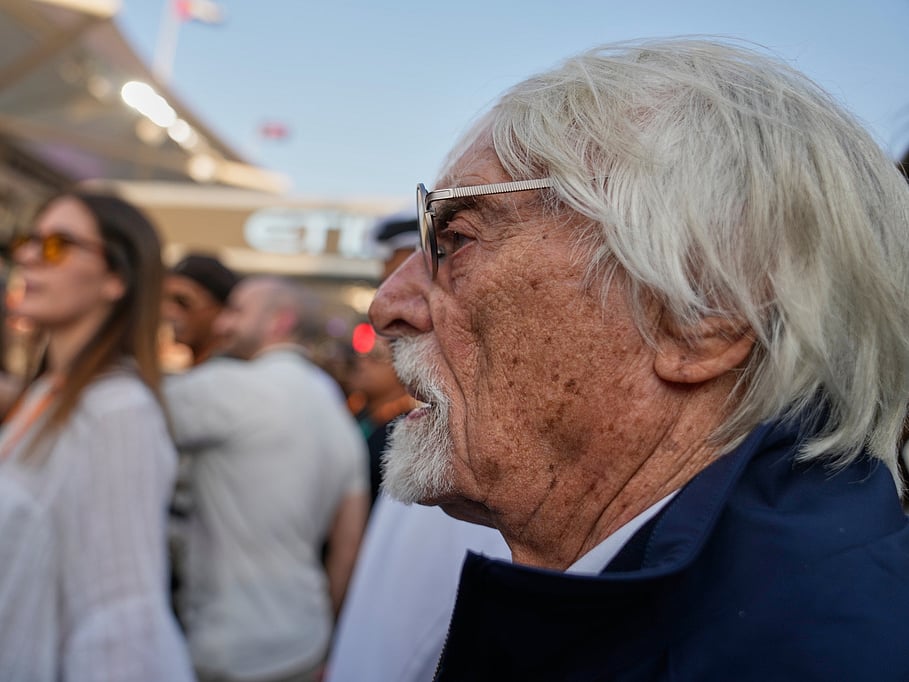 Former Formula One chief Bernie Ecclestone stands on the starting grid before the Abu Dhabi Formula One Grand Prix in Abu Dhabi, United Arab Emirates, Dec. 7, 2025.  