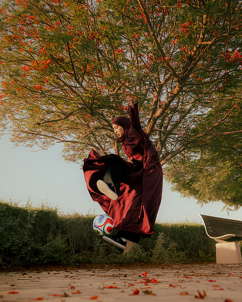Dubai photographer's mid-air shot of viral hijabi footballer wins top Flame Tree Season prize