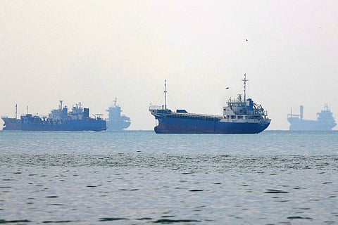 Vessels transit the Hormuz Strait off the coast of Iran's southern port city of Bandar Abbas on September 7, 2026.