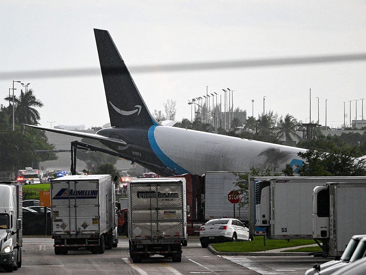 The tail section of a cargo plane is seen at Miami International Airport after it overran the runway at Miami International Airport in Miami, Florida.