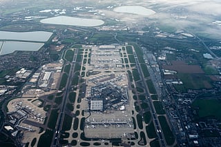 FILE- Heathrow Airport is seen from an airplane, Oct. 6, 2025, in London. (AP Photo/Julia Demaree Nikhinson, File)