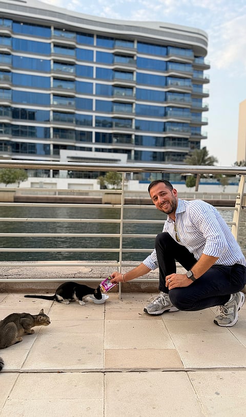 Gianluca Santangelo on his daily run feeding the community's stray cats