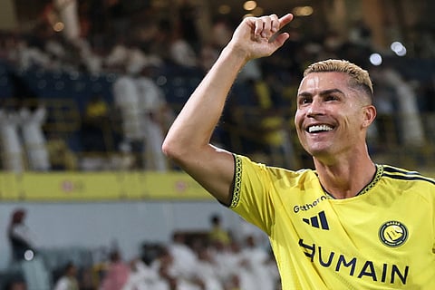 Nassr's Portuguese forward #07 Cristiano Ronaldo celebrates after scoring his team's first goal during the Saudi Pro League football match between Al-Nassr and Abha at the Al-Awwal Park stadium in Riyadh on September 9, 2026.