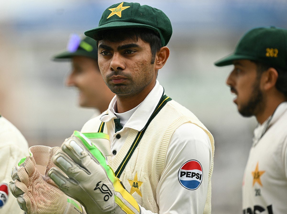 Pakistan's Mohammad Ghazi Ghori walks out on the pitch for England's 1st innings on day one of the third test match between England and Pakistan at Edgbaston cricket ground in Birmingham, central England, on September 9, 2026.