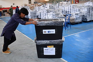 In this photo taken on September 8, 2026, a worker pushes a box containing election paraphernalia in Marawi City, Lanao Del Sur province, on the southern island of Mindanao, ahead of elections in the Bangsamoro Autonomous Region in Muslim Mindanao (BARMM) on September 14.
