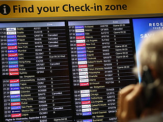 Cancelled flights are pictured on an electronic check-in display board at Terminal 3 of London Heathrow airport, west of London on September 8, 2026.