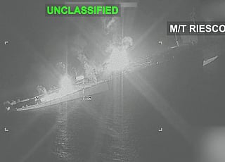 Iranian crude oil carrier M/T Riesco burns after being struck by US forces in the Gulf of Oman, in this still from video released by US Central Command on September 8.