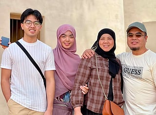 Abu Dhabi-based architect Gilbert “Abdurahman” Fulgar Agao (right) together with his family
