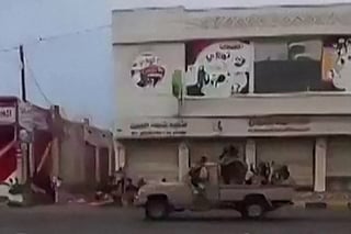This video grab taken from UGC images posted on social media on September 10, 2026, shows Houthi fighters inside Yemen's strategic Red Sea port city of Mocha.