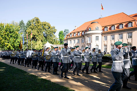 The German Military Band participates in a state visit reception for UAE President His Highness Sheikh Mohamed bin Zayed Al Nahyan, (not shown), at Villa Borsig in Berlin.