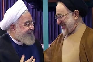 Former Iranian presidents Mohammad Khatami (left) and Hassan Rouhani. 