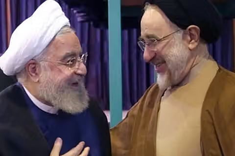 Former Iranian presidents Mohammad Khatami (left) and Hassan Rouhani. 