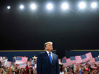 US President Donald Trump walks on stage to speak on the first day of the 2026 Republican National Convention at the American Airlines Center on September 09, 2026 in Dallas, Texas