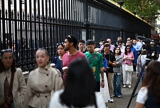 People queue to enter the British Museum in London on September 10, 2026, on the first day of the Bayeux Tapestry exhibition.