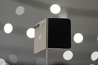 The iPhone Duo is displayed during an announcement of new products on Wednesday, Sept. 9, 2026, on the Apple campus in Cupertino, Calif. (AP Photo/Jeff Chiu)
