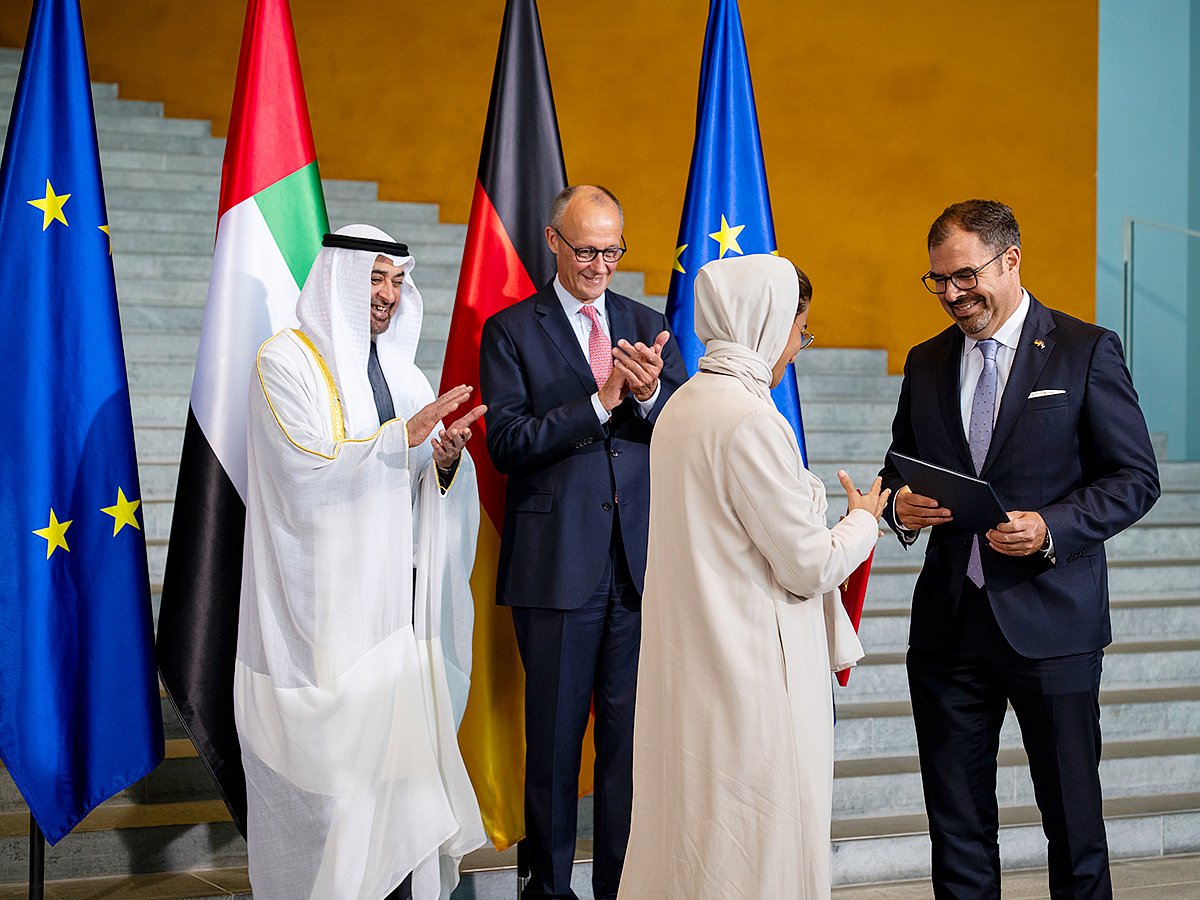 UAE President His Highness Sheikh Mohamed bin Zayed Al Nahyan and His Excellency Friedrich Merz, Chancellor of Germany, witness exchange of agreements between the UAE and Germany, at the Federal Chancellery during a state visit. Seen exchanging on behalf of the UAE is Noura bint Mohamed Al Kaabi, UAE Minister of State and on behalf of Germany is Florian Hahn, State Minister at the Federal Foreign Office of Germany. 