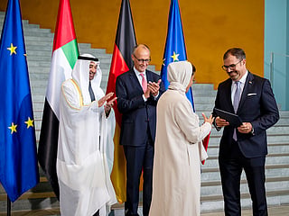 UAE President His Highness Sheikh Mohamed bin Zayed Al Nahyan and His Excellency Friedrich Merz, Chancellor of Germany, witness exchange of agreements between the UAE and Germany, at the Federal Chancellery during a state visit. Seen exchanging on behalf of the UAE is Noura bint Mohamed Al Kaabi, UAE Minister of State and on behalf of Germany is Florian Hahn, State Minister at the Federal Foreign Office of Germany. 