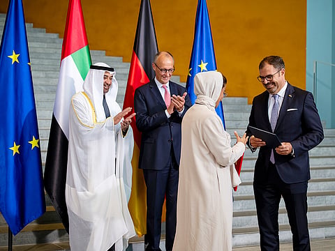 UAE President His Highness Sheikh Mohamed bin Zayed Al Nahyan and His Excellency Friedrich Merz, Chancellor of Germany, witness exchange of agreements between the UAE and Germany, at the Federal Chancellery during a state visit. Seen exchanging on behalf of the UAE is Noura bint Mohamed Al Kaabi, UAE Minister of State and on behalf of Germany is Florian Hahn, State Minister at the Federal Foreign Office of Germany. 