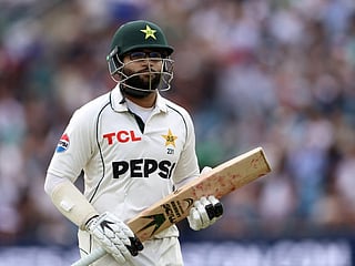 Pakistan's Imam-ul-Haq walks back to the pavilion after losing his wicket on the opening day of the first test match between England and Pakistan at Headingley cricket ground in Leeds, northern England on August 19, 2026.