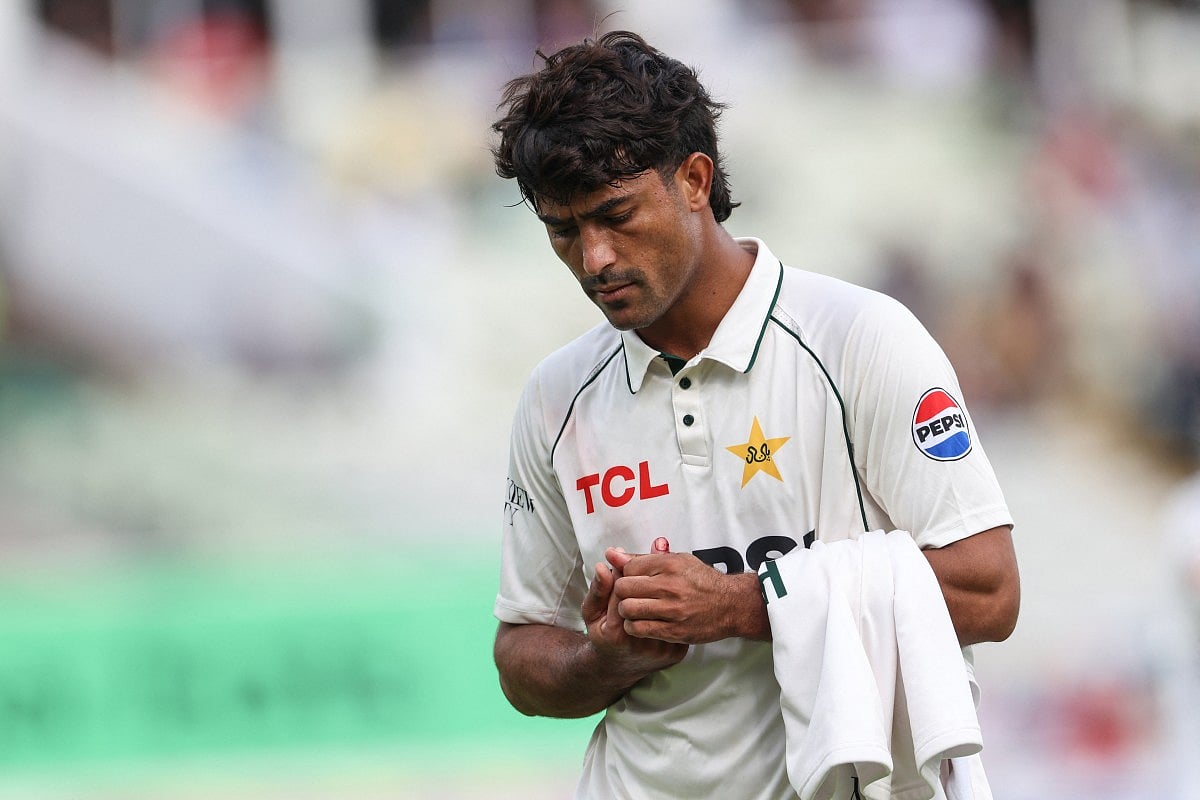 Pakistan's Razaullah leaves the field for treatment on an injury on day four of the third Test match between England and Pakistan at Edgbaston cricket ground in Birmingham, central England, on September 12, 2026.
