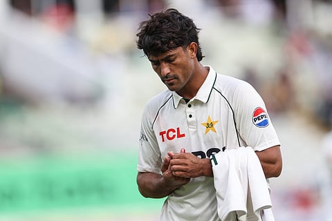Pakistan's Razaullah leaves the field for treatment on an injury on day four of the third Test match between England and Pakistan at Edgbaston cricket ground in Birmingham, central England, on September 12, 2026.