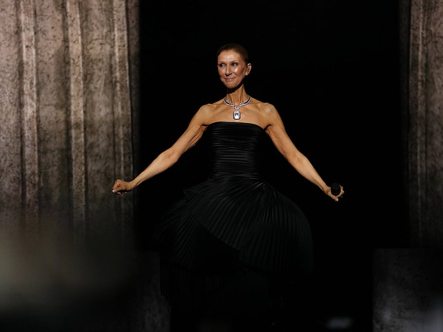 Singer Celine Dion performs during the opening concert of her 'Celine Dion Paris 2026' residency at the Plenitude Arena in Nanterre, outside Paris, Saturday, Sept. 12, 2026. (AP Photo/Aurelien Morissard)