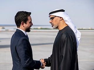Sheikh Khaled bin Mohamed bin Zayed Al Nahyan, Crown Prince of Abu Dhabi and Chairman of Abu Dhabi Executive Council (R), receives HRH Hussein bin Abdullah, Crown Prince of Jordan (L), at the airport.