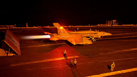 An F/A-18 Super Hornet launches from the USS George Washington aircraft carrier. US naval forces are reportedly preparing for possible renewed strikes against Iran as Washington weighs further military action.