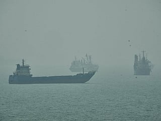 Commercial vessels anchored amid haze in the Strait of Hormuz off Bandar Abbas, Iran, Monday, Sept. 7, 2026. (AP Photo/Vahid Salemi)