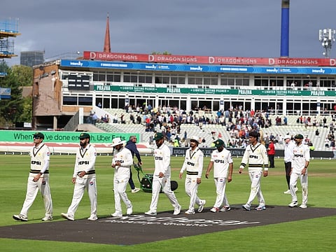 Pakistan players walk off after their defeat on day four of the third Test against England at Edgbaston cricket ground in Birmingham, central England, on September 12, 2026.