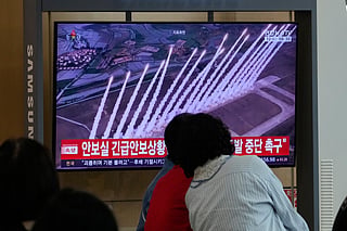 A TV screen shows a file photo of a North Korean missile launch during a news program at Seoul Railway Station in Seoul, South Korea, Saturday, Sept. 12, 2026. (AP Photo/Ahn Young-joon)