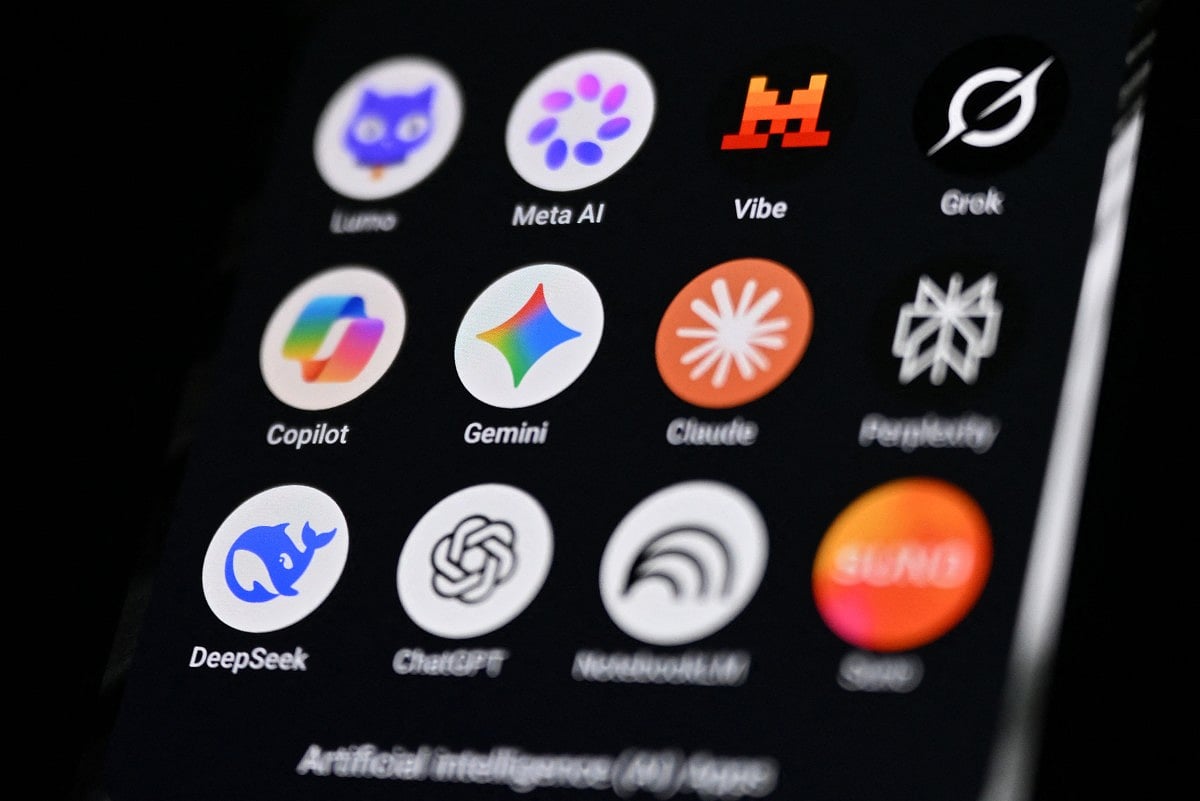 This photograph shows a handheld smartphone displaying the icons of some of the main artificial intelligence based apps, including LLMs, chatbots and generative AI, with logos (from L) of Proton AG's Lumo, Meta AI, Mistral Vibe (formerly Le Chat), xAI's Grok, Microsoft's Copilot, Google's Gemini, Anthropic's Claude, Perplexity, Deepseek, OpenAI's Chat GPT, Google's Notebook LLM and generative AI music app Suno, in Saint-Mande, east of Paris, on July 15, 2026.
