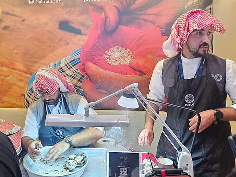 Field researchers Mohamed Slaise and Ahmed Ramadhan from Danat Bahrain Institute for pearls and gems stones at ATM 2026.