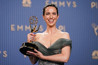 Kate O'Flynn poses in the press room with the award for outstanding supporting actress in a comedy series for "Widow's Bay" during the 78th Emmy Awards on Monday, Sept. 14, 2026, at the JW Marriott in Los Angeles. (Photo by Richard Shotwell/Invision/AP)