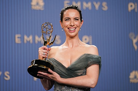 Kate O'Flynn poses in the press room with the award for outstanding supporting actress in a comedy series for "Widow's Bay" during the 78th Emmy Awards on Monday, Sept. 14, 2026, at the JW Marriott in Los Angeles. (Photo by Richard Shotwell/Invision/AP)