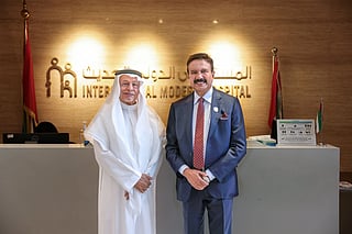 Mr. Aidroos representing ATDI and Dr. Azad Moopen, Chairman of Aster DM Healthcare