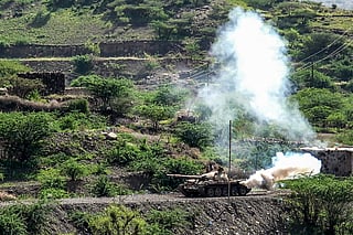 A battle tank advances during ongoing fighting between Houthi and Saudi-backed Yemeni government forces along the frontlines in al-Kadha, west of Taiz in western Yemen, on September 16, 2026.