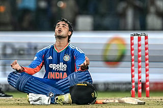India's Abhishek Sharma celebrates after scoring a century (100 runs) during the third T20 international cricket match between India and Afghanistan at the Arun Jaitley Stadium in New Delhi on September 17, 2026.