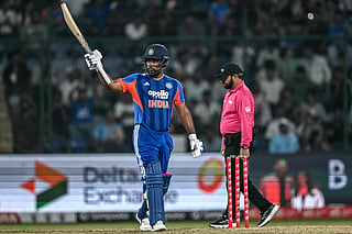 India's Sanju Samson (L) celebrates after scoring a half-century (50 runs) during the third T20 international cricket match between India and Afghanistan at the Arun Jaitley Stadium in New Delhi on September 17, 2026.
