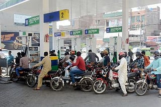 Crude oil supply risks elevated as US President Donald Trump rejected an Iranian proposal to reopen the Strait of Hormuz, driving oil prices up on Tuesday. A queue at a fuel pump in Pakistan. 