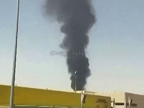 Smoke rises near Riyadh airport on September 19 after Yemen’s Houthis announced strikes on targets in the Saudi capital and coastal oil facilities. 