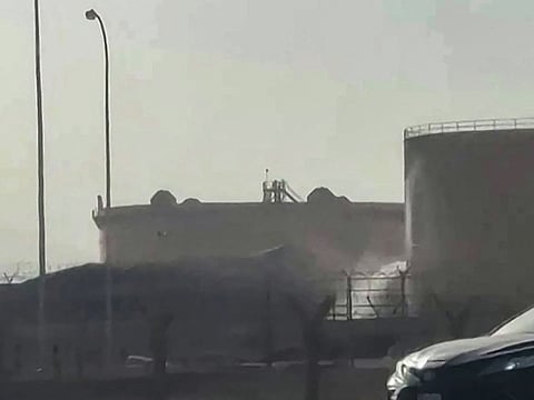This frame grab taken from AFPTV video footage on September 19, 2026 shows a tank leaking at the scene of a fire at the Aramco fuel depot near King Khalid International Airport in Riyadh. 