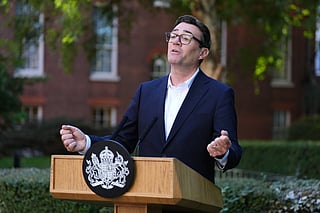 Britain's Prime Minister Andy Burnham gives a speech during a reception at 10 Downing Street, London, Monday Sept. 21, 2026, to recognise the contribution of organisations and volunteers who supported communities across the UK this summer, through the recent heatwaves, wildfires and other emergencies. (Jonathan Brady/Pool Photo via AP)
