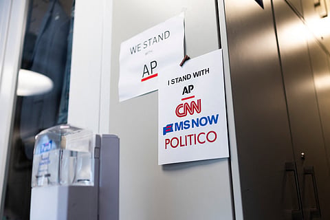 Signs of support for AP, CNN, MS NOW and POLITICO hang on the White House grounds on September 21, 2026 in Washington, DC. Reporters from MS NOW, CNN, and Politico have been blocked from accessing the White House since September 19th after President Trump said he was banning the three outlets from the property.