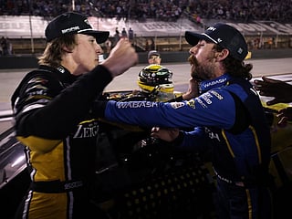 Carson Hocevar, driver of the #77 Zeigler Auto Group Chevrolet, (L) and Ryan Blaney, driver of the #12 WABASH Ford, get into an altercation after the NASCAR Cup Series Bass Pro Shops Night Race at Bristol Motor Speedway on September 19, 2026 in Bristol, Tennessee.