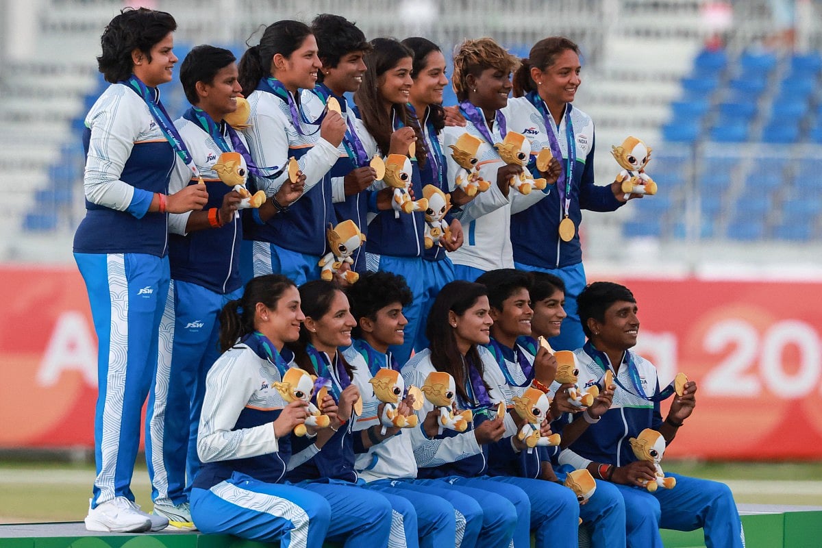 Gold medallists India pose on the podium for the women's cricket event during the 2026 Asian Games at Korogi Athletic Park in Nisshin, Aichi prefecture on September 22, 2026.